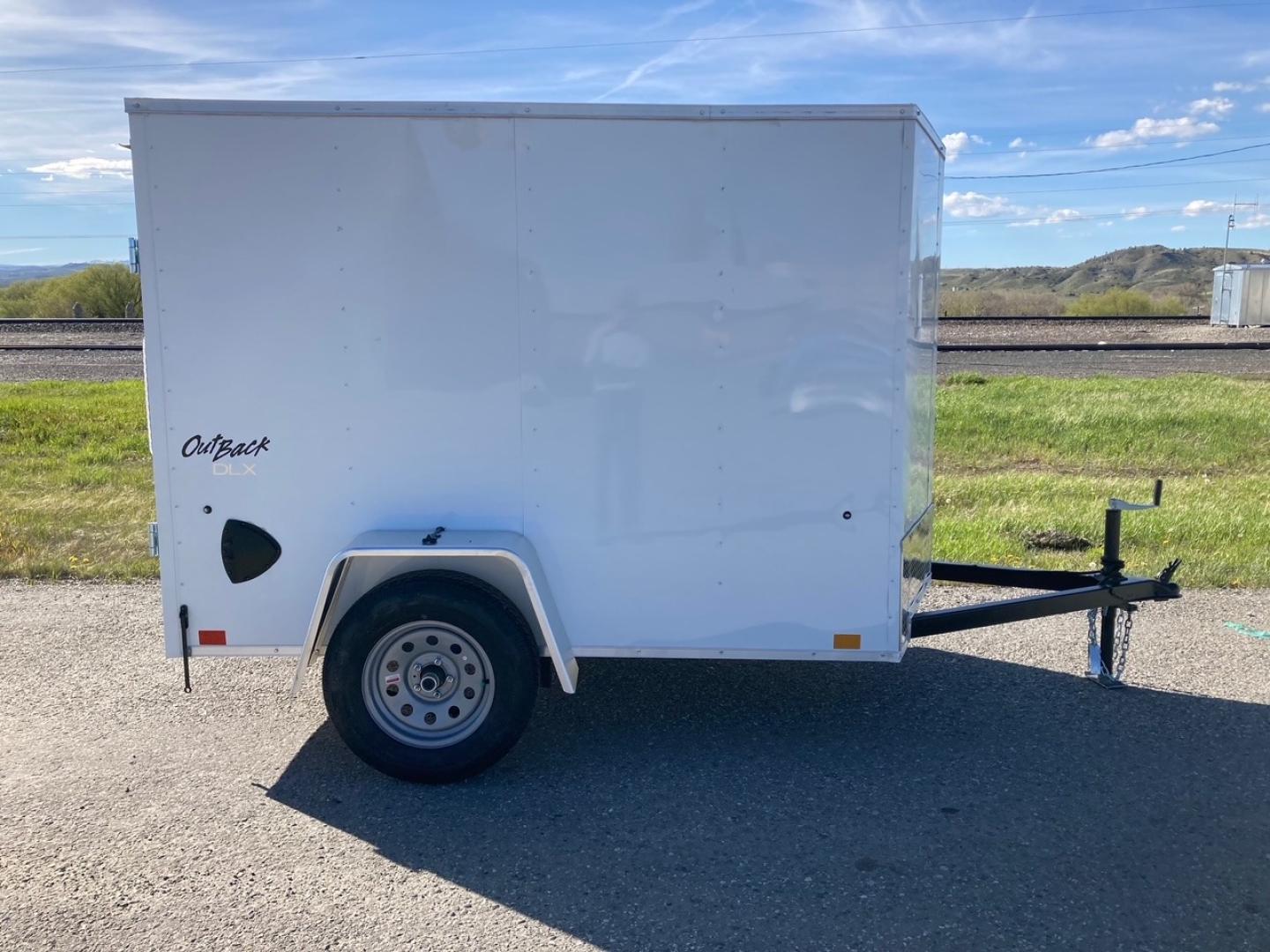 2024 Pace , located at 310 West 1st Ave, Big Timber, MT, 59011, (406) 860-8510, 45.833511, -109.957809 - Pace American Outback DLX 5 x 8 Enclosed Cargo, V-nose, 3k gvw, spring suspension, swing outdoor rear door, all lights LED, interior dome light with wall switch, high performance wood floor and sidewall interior, top wind jack, one piece aluminum roof, 15" radial tires, 2" coupler, quick lube hubs, - Photo#0